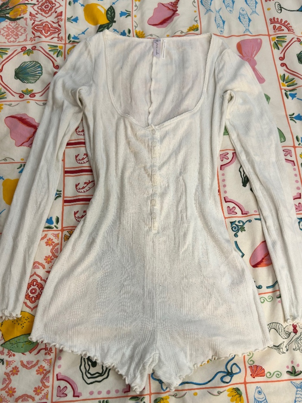 Out from under onesie size small